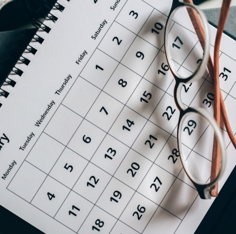 paper calendar with glasses